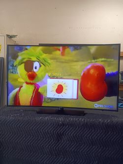 55 inch curved tv Samsung 4k smart ultra HD beautiful tv comes with remote control shows great quality clear picture works perfect guaranteed