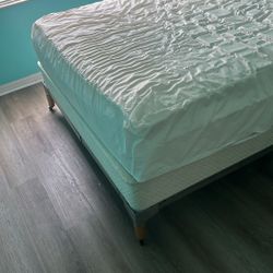 Queen Bed Covered With Box And Bottom Frame