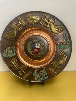 vintage decorative 13” wall plate from Peru,