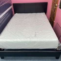 Black Faux leather Queen size bed frame, and 12”Memory Foam Mattress, in Excellent Condition, Mattress Are Sanitized And Sealed In Plastic,