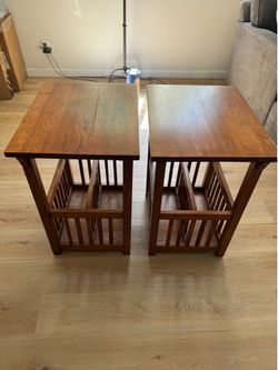Two Mission style side tables. Both in good condition, however, table on the right as damage to the top.