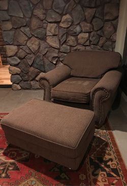 Chair and ottoman— nailhead and very comfy and high style! Great buy like new!