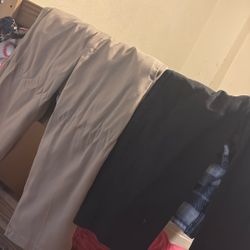 2 Pairs Of Dickies Black And Caqui Both Are 34 X 30