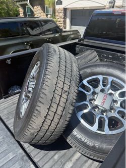 Full set of GMC Rims with Tires-$800