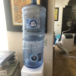 2 recently emptied 5gallon water bottles