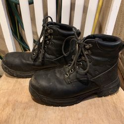 Work boots with steel toes. Size: 8.5