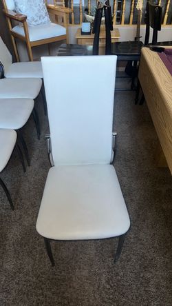 8 white stainless steel chairs