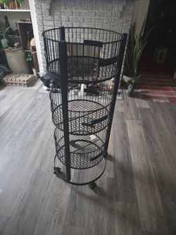 Round metal   shelves 3 baskets 43in tall