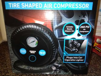 Brand new tire compressor plugs in cigarette lighter