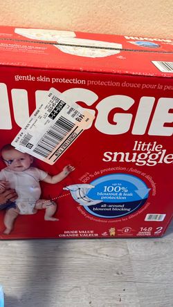 Diapers Huggies and  LuVs