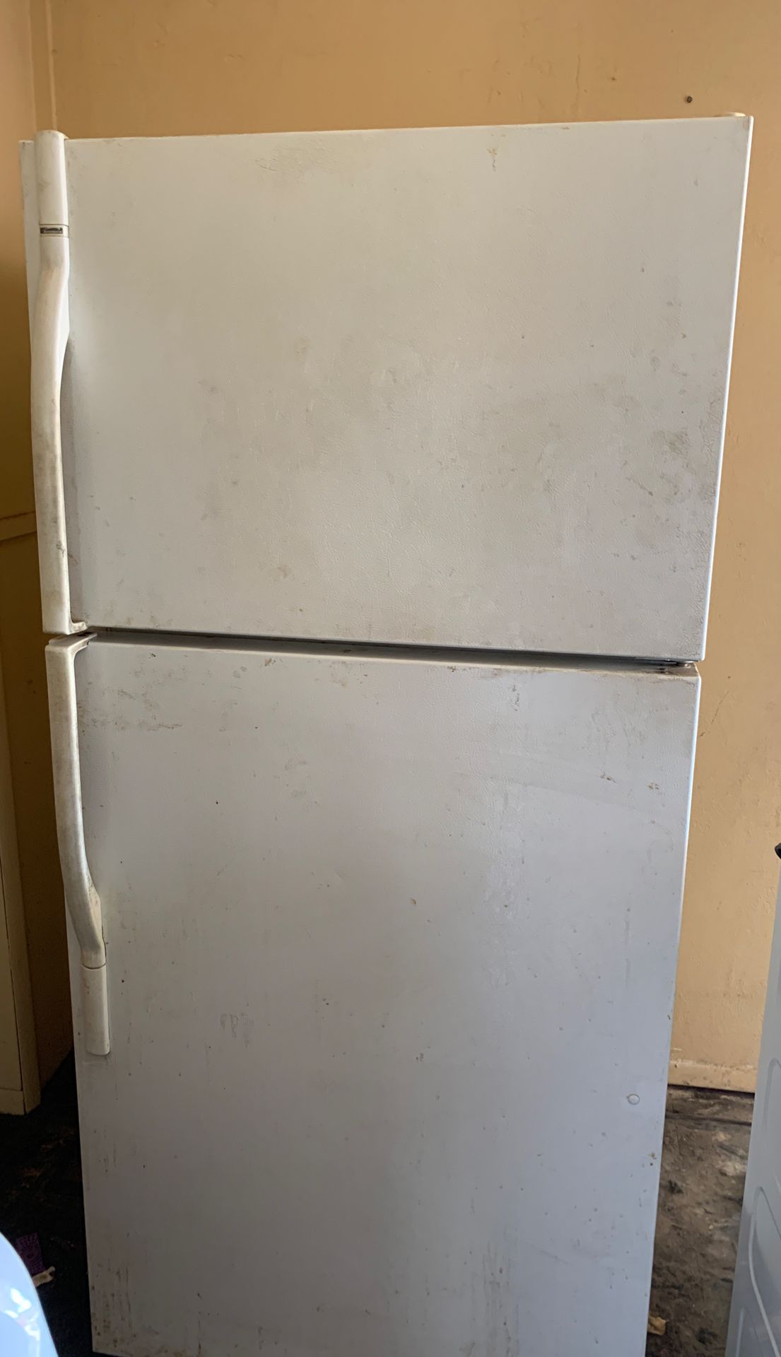 Pending pick up, Free refrigerator freezer needs cleaned but works great