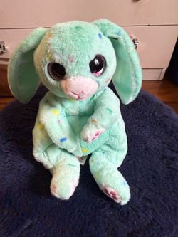This is a Ty Beanie Bellies April the Green Plush bunny rabbit with multicolor confetti spots and glittery pink eyes