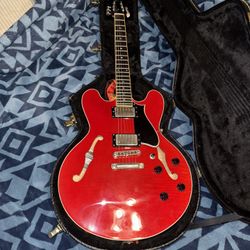 The Heritage Cheery Red Guitar W/ Case