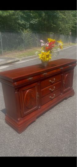Solid wood long dresser with big drawers . Drawer sliding smoothly