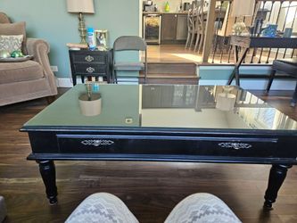 Black solid wood coffee table with custom glass top from World Market