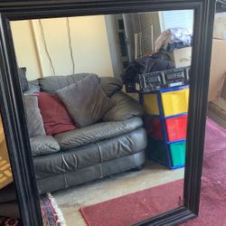 ESPEJO CON MADERA A LA ORILLA