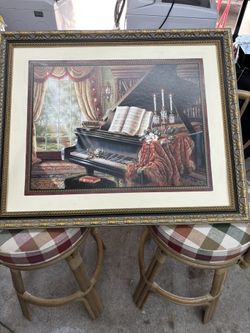 Framed Print of an Interior Scene with Piano