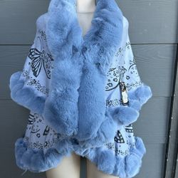 Women’s Ponchos And Coats 