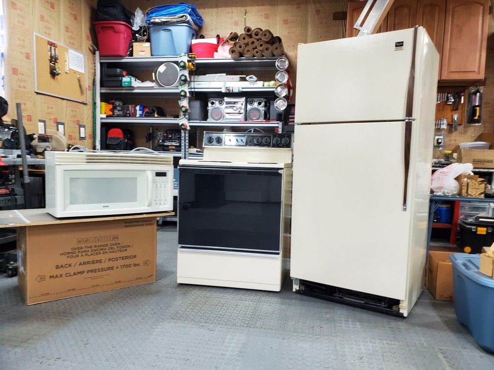 Kitchen Appliance Set Refrigerator Stove And Microwave