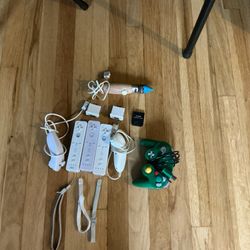 Assorted Video Game Consoles, Games And Accessories