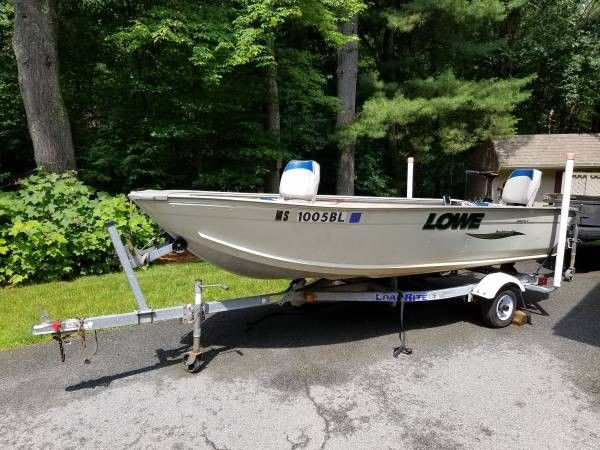 2002 LOWE SeaNymph V, 1467 WT, with 15 hp Mercury two stroke motor with electric start and Load Rite trailer