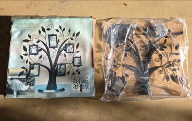 Tree of Life metal picture frame holder. Brand new, unopened package. 12"H x 11"W, holds 6 small photos. Tabletop home decor.