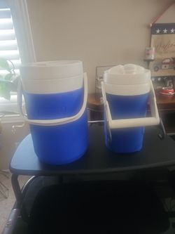 Two Coleman Water containers
