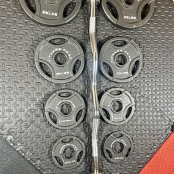 Olympic Equipment: Brand NEW Curl Bar of 20# with Cooper Bearings and Plates 2X25s, 2X10s, 2X5 and 2X2.5s pounds. Brute 105#