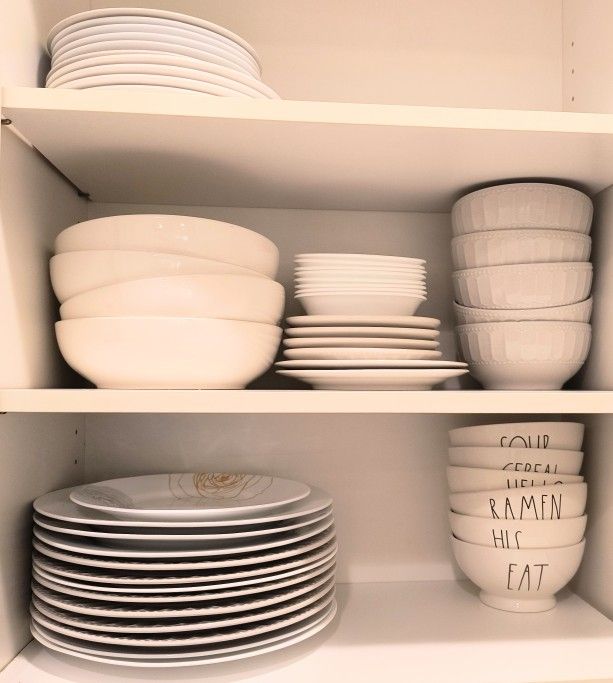 White Plates, Bowls, 14 hardly used wine glasses (4 were used for staging), 10 glasses, 4 glass mugs. Good condition. 
