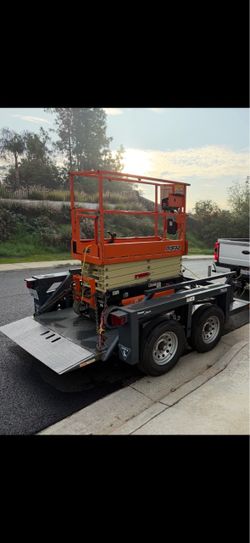 Triple L hydraulic flatbed utility trailer