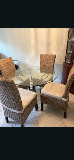 Set Of 4 wicker chairs with glass top table