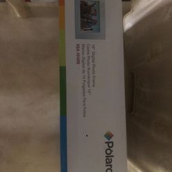 Brand new Polaroid 10 inch digital photo frame. you pay for shipping    $15.00