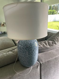 Blue lamp with white shade
