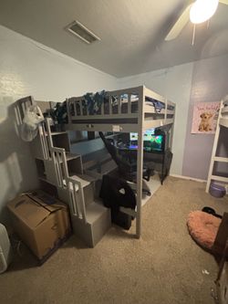 Full loft bed with desk and staircase