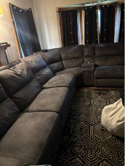 Sectional electric reclining couch
