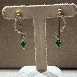 Pair Of Gold Earrings 