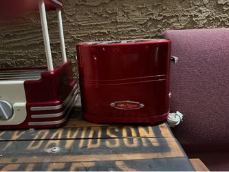 Hot dog roller/cooker and bun warmer