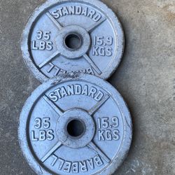 Pair Of Olympic 35 LB Plates 2” Hole 
