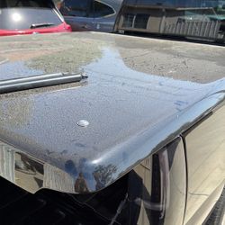 Used Truck Bed Cover Black 80 X 72 With Shocks