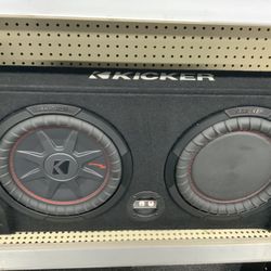 Kicker Sealed downward-firing enclosure with CompRT 10" shallow-mount subwoofer 