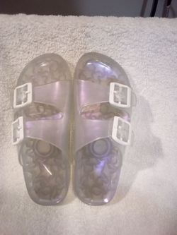 Girl  clear with light purple glare Jell  sandals  with two  white buckles on each side $6.00