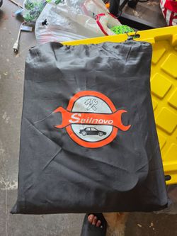 Never used: Sailnovo Truck Bed Cargo Bag, 26 Cubic ft Waterproof Cargo Bag for Truck Bed