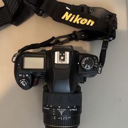 Nikon N80 Camera With Quantaray Lens.