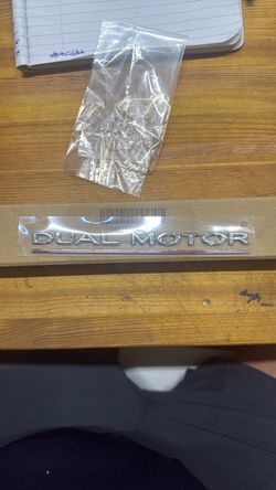 Tesla. Dual Motor Emblem