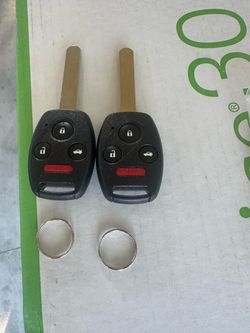 Set of two new uncut ready to be program honda keys