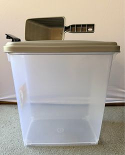 Pet food storage container and scoop