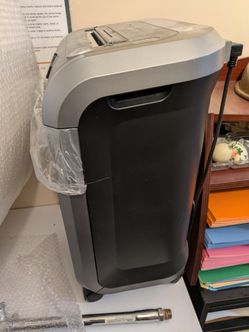 Paper Shredder.  Fellowes Brand.  Please Excuse The Dust! 