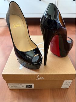 Authentic Christian Louboutin “Lady Peep 150” patent leather heels in classic black.