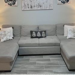 Upholstery sleeper, dual chaise sofa with storage space.