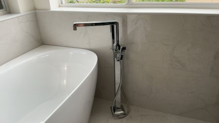 Tub filler